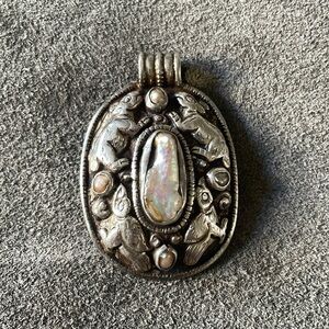 Silver Pearl Carved Animal Medallion Pendant